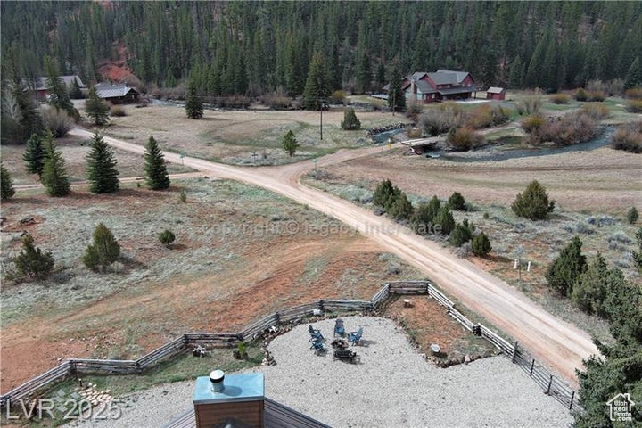 Bird\'s eye view featuring a wooded view