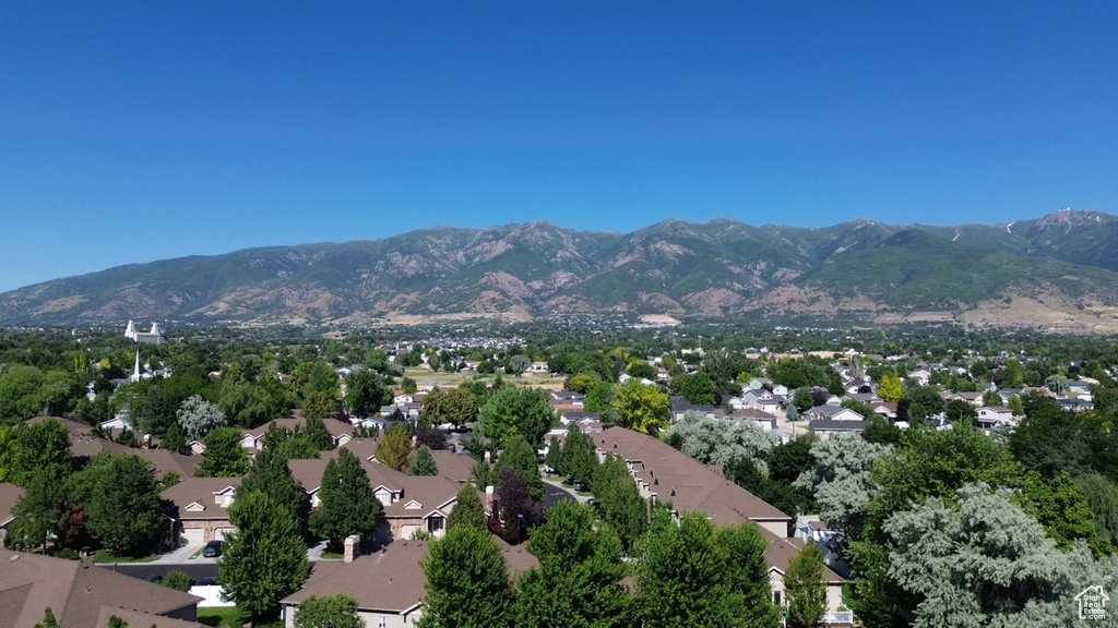 Birds eye view of property featuring a residential view and a mountain view