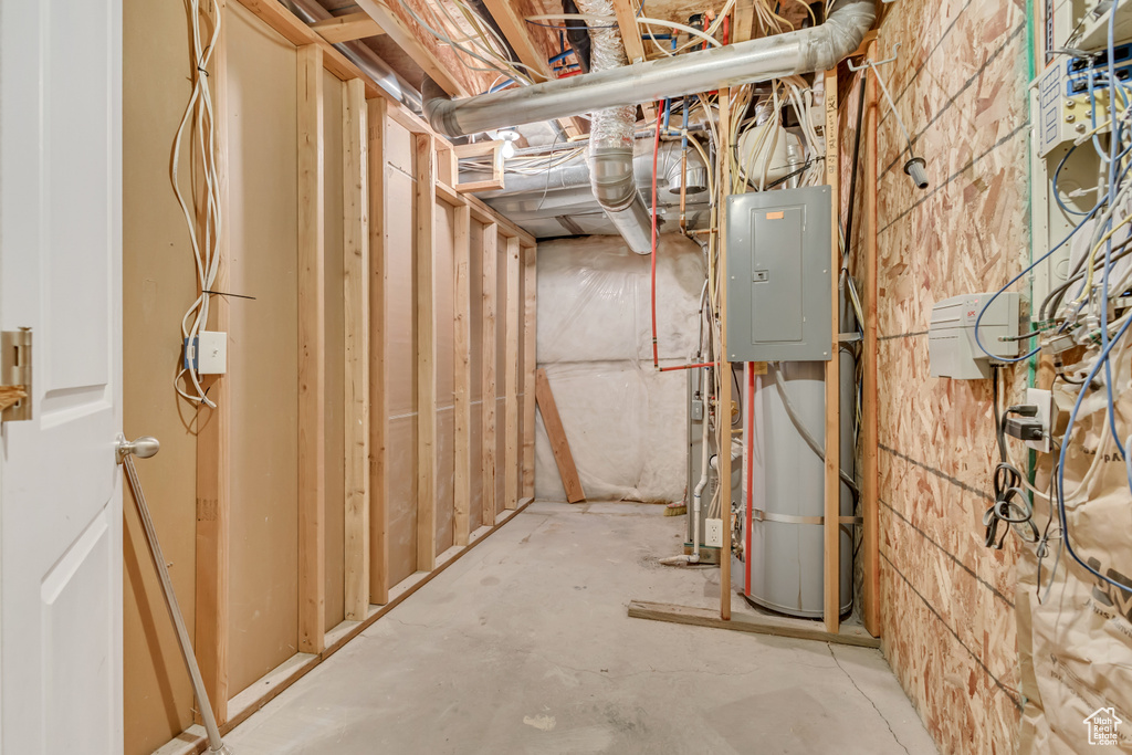 Unfinished basement with electric panel