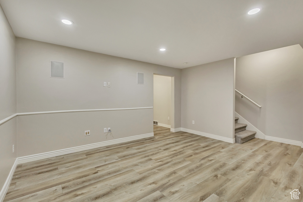 Below grade area featuring baseboards and recessed lighting