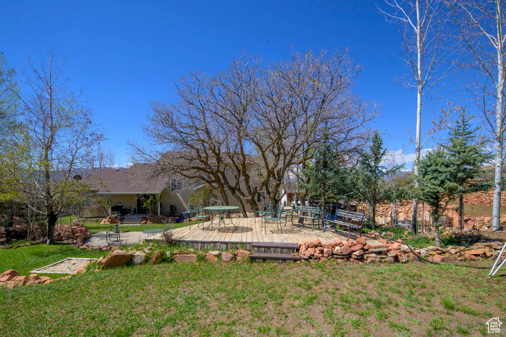 View of yard featuring a deck