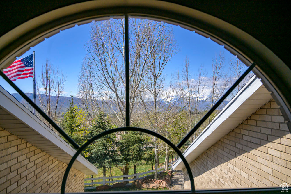 Exterior details with a mountain view and brick siding