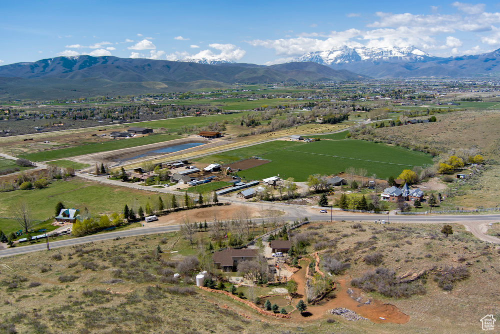 Birds eye view of property featuring a mountain view