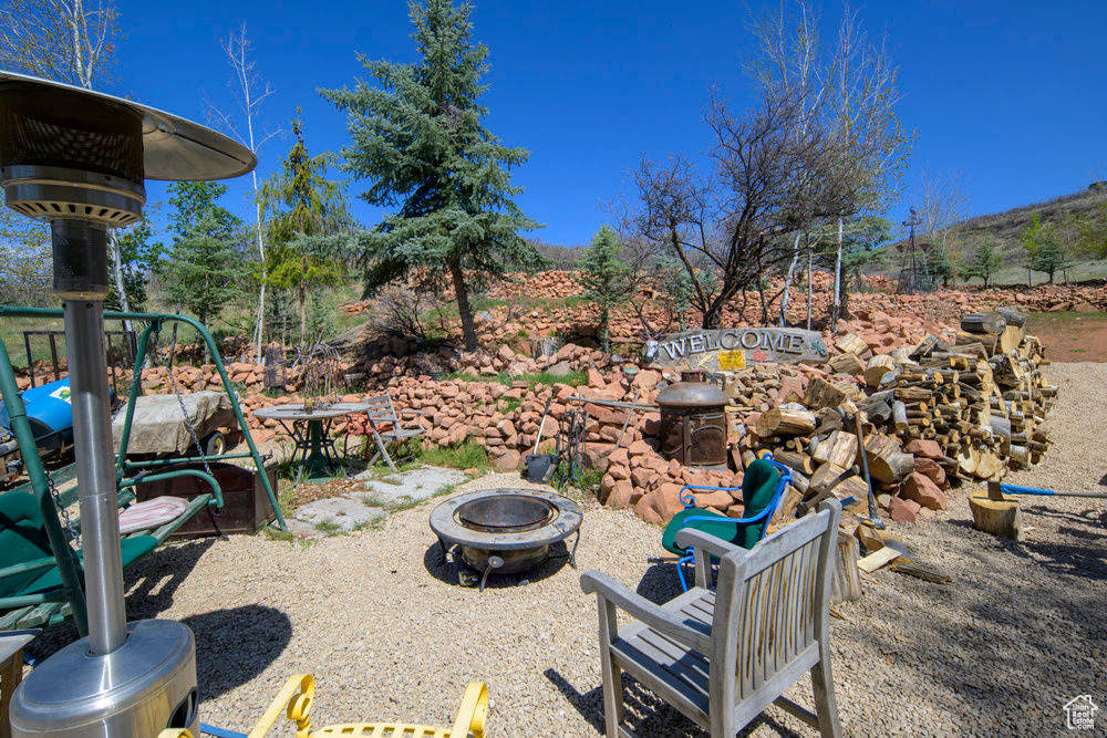 View of yard with a fire pit