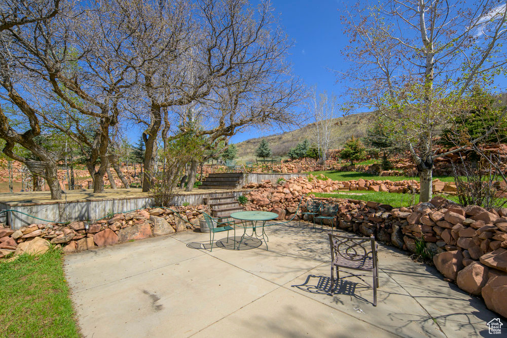 View of patio featuring a mountain view