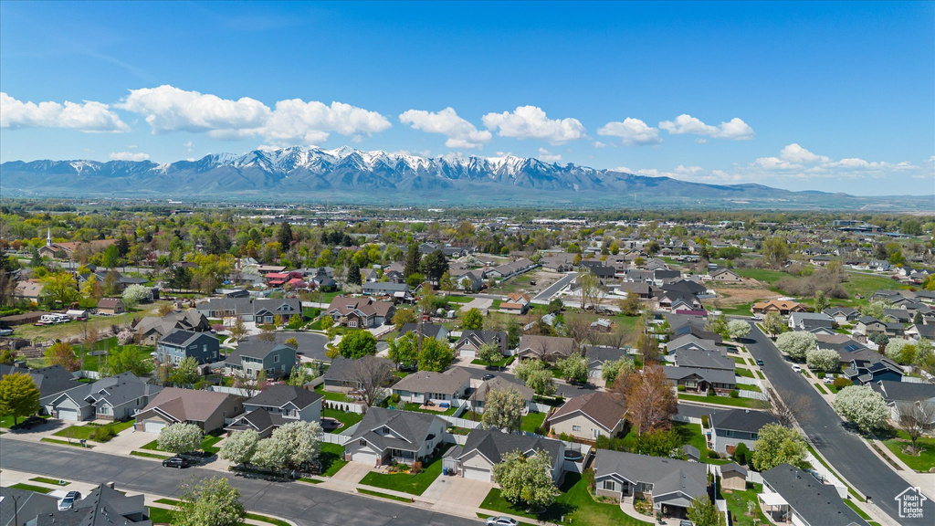 Aerial view featuring a mountain view and a residential view