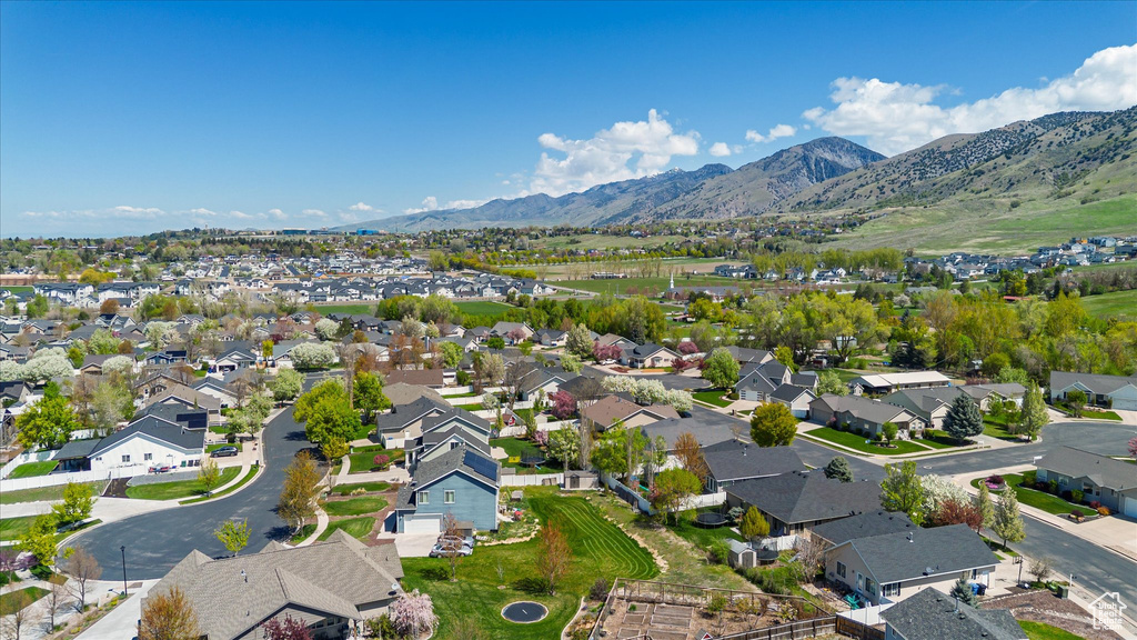 Drone / aerial view with a residential view and a mountain view