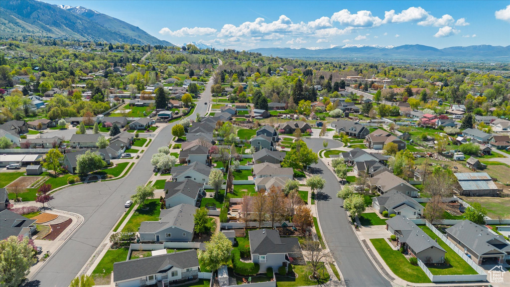 Aerial view featuring a residential view and a mountain view