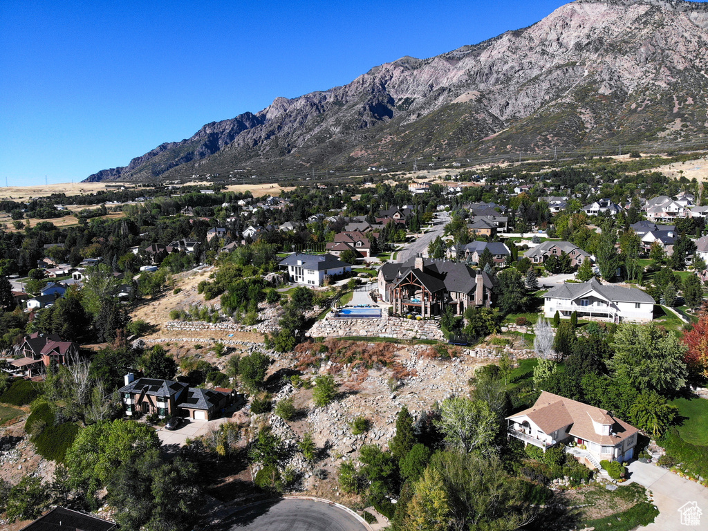 Drone / aerial view with a residential view and a mountain view