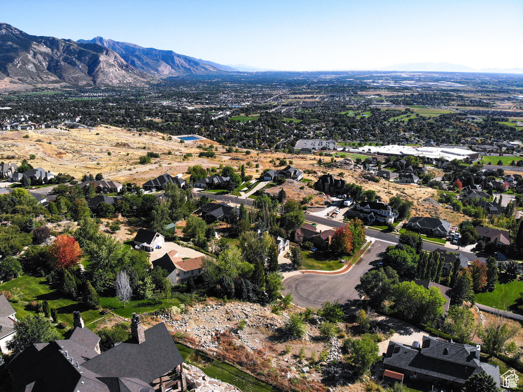 Drone / aerial view with a mountain view and a residential view