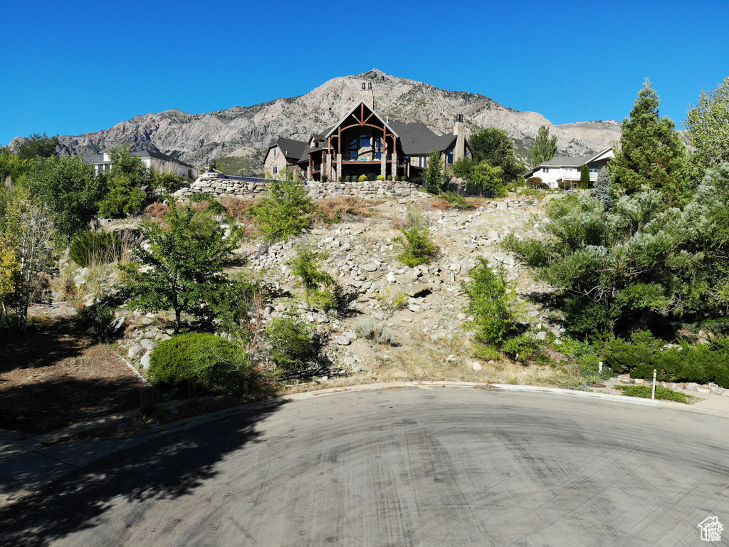 View of front of home featuring a mountain view