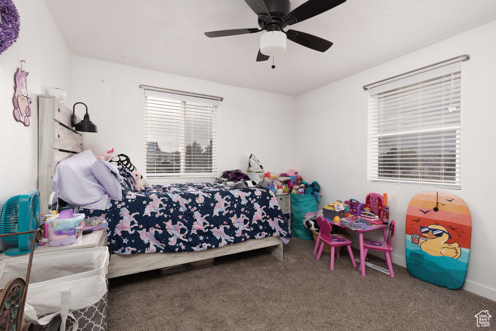 Bedroom featuring carpet floors and a ceiling fan