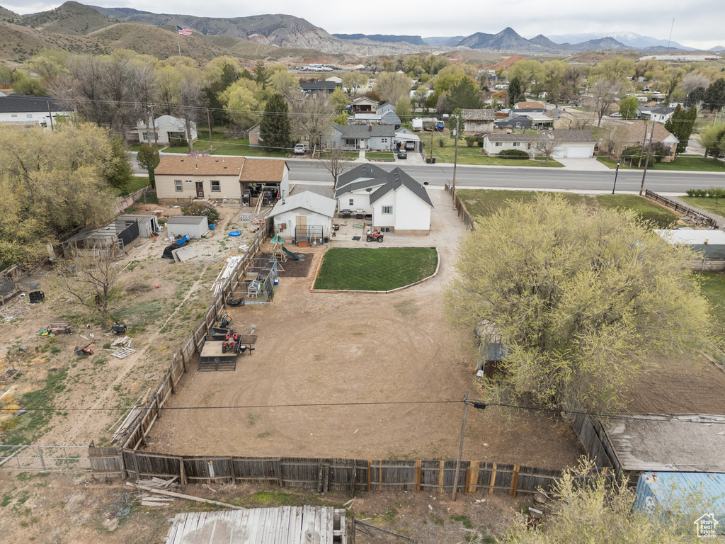 Aerial view featuring a mountain view and a residential view