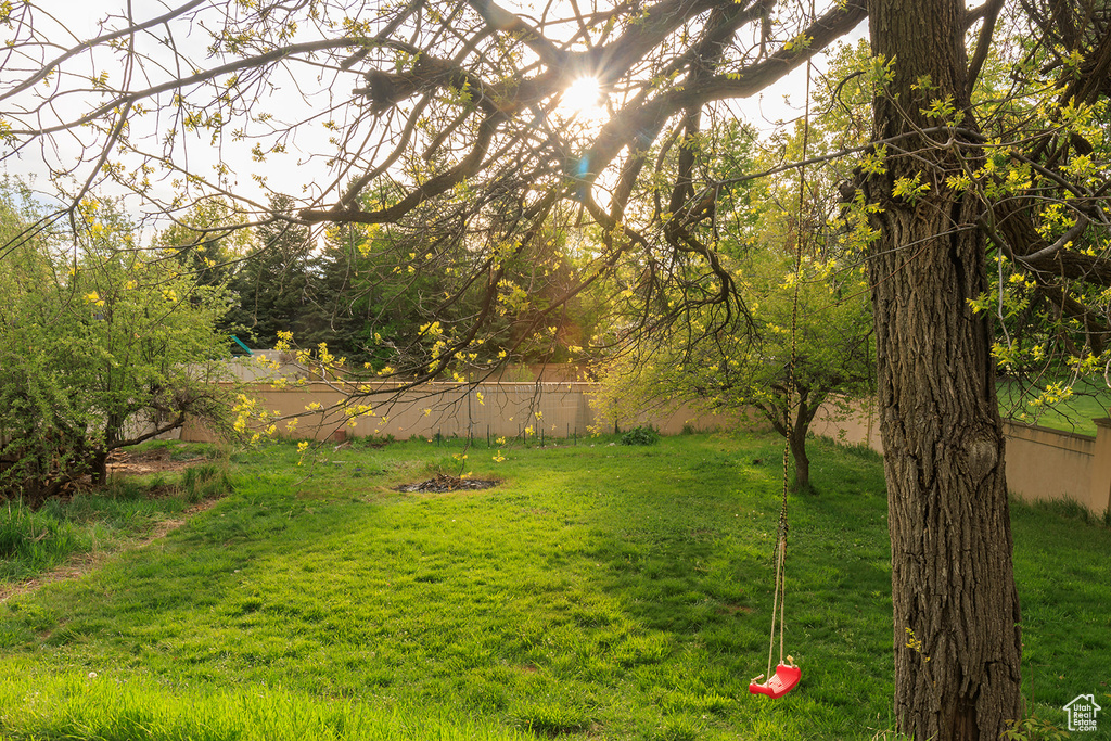 View of yard with fence
