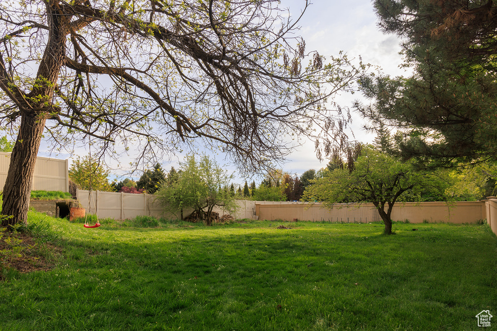 View of yard with fence