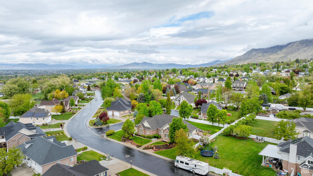 Birds eye view of property featuring a residential view and a mountain view