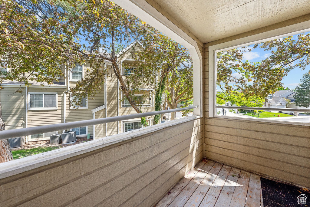 Balcony featuring central air condition unit