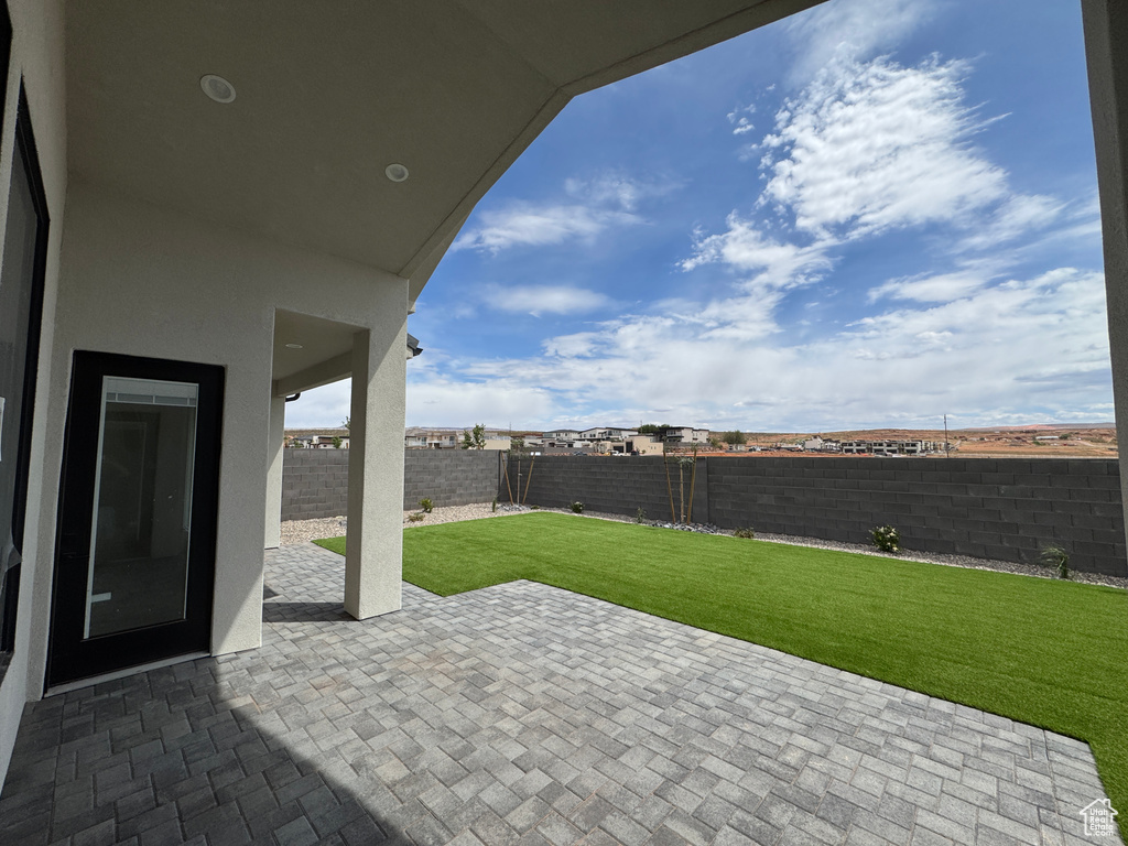 View of patio featuring a fenced backyard