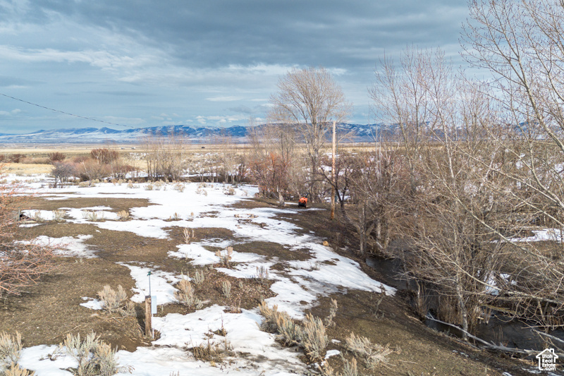 View of yard featuring a mountain view