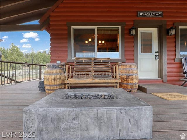 Doorway to property with covered porch