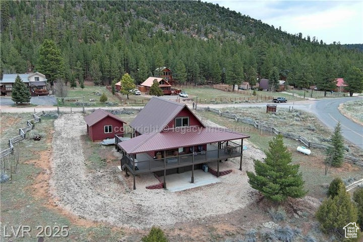 Bird\'s eye view with a mountain view and a forest view