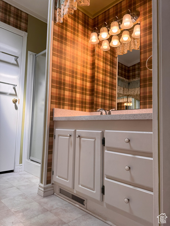 Full bath featuring wallpapered walls, visible vents, and a shower stall