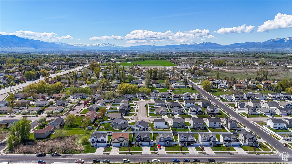 Birds eye view of property featuring a mountain view and a residential view