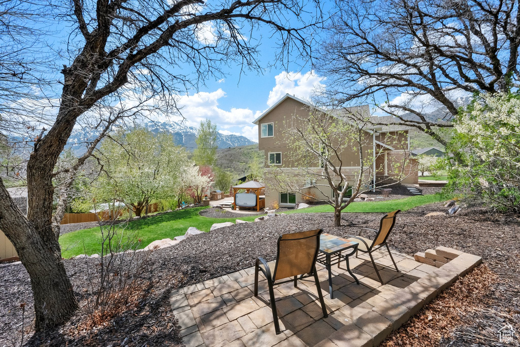 View of patio / terrace with a gazebo and fence