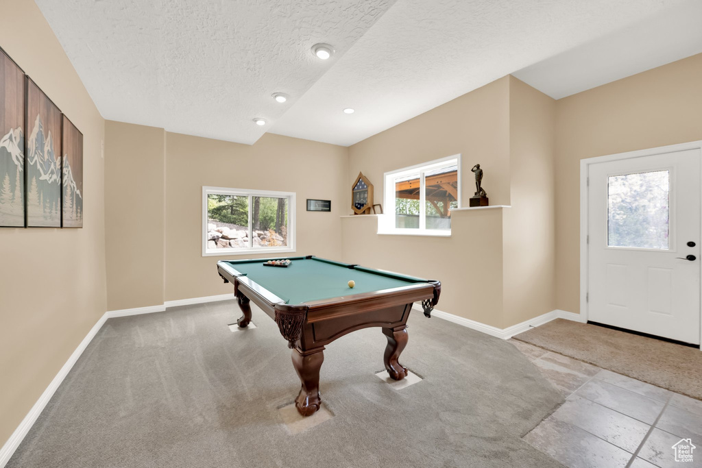 Playroom with billiards, baseboards, carpet, and a textured ceiling