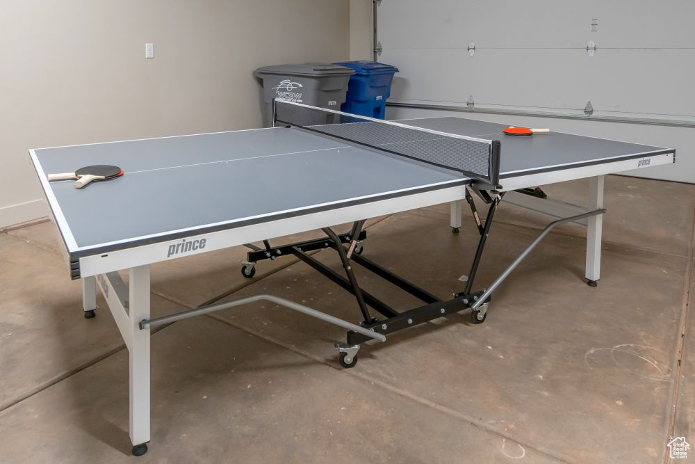 Recreation room featuring concrete floors