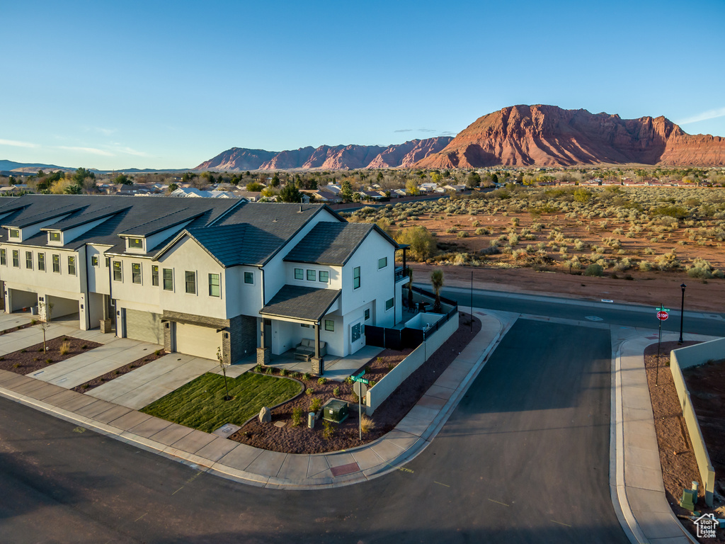 Drone / aerial view featuring a mountain view and a residential view