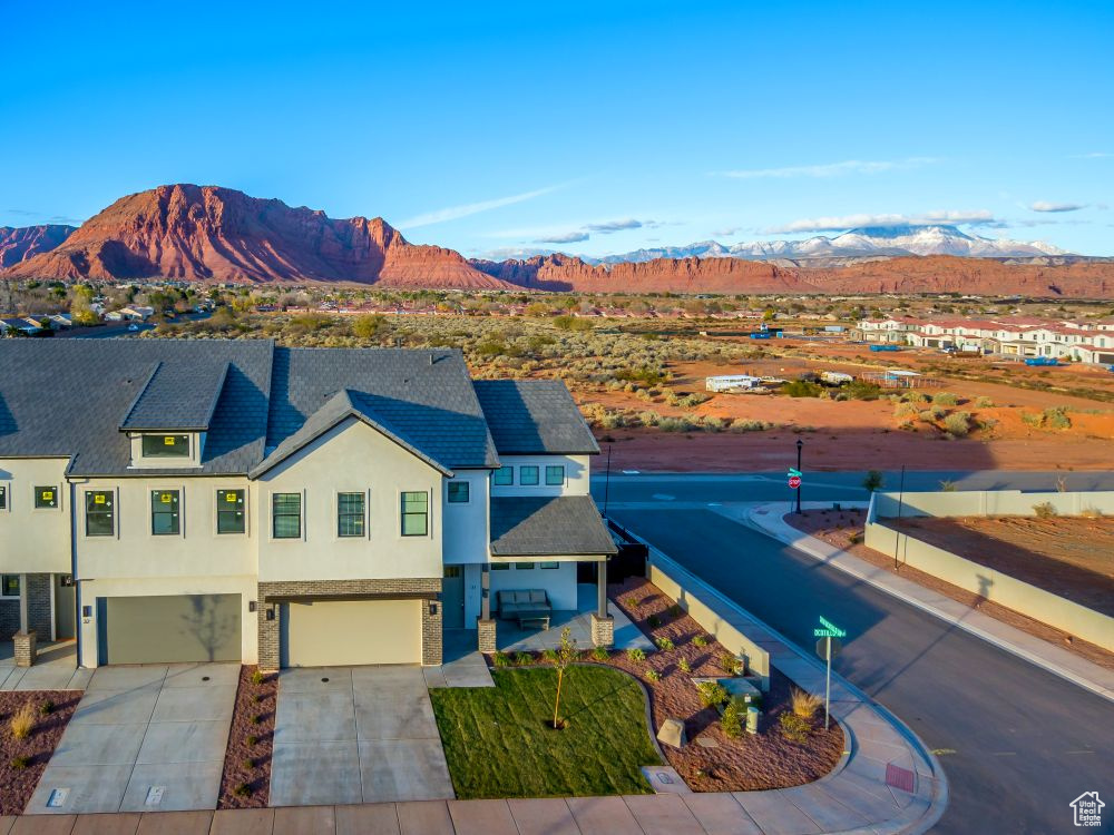 Drone / aerial view featuring a mountain view