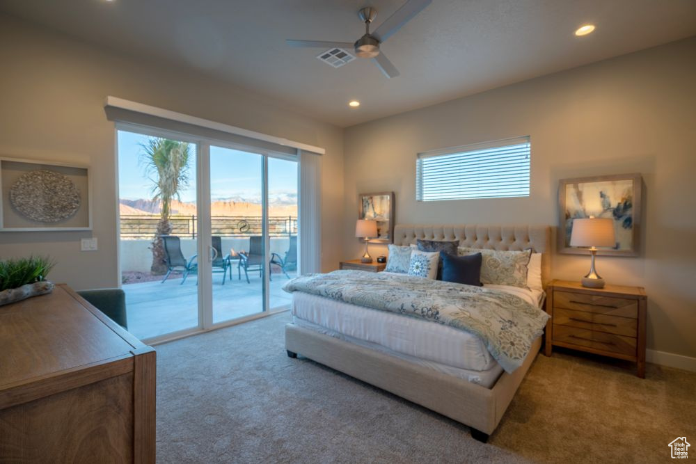Bedroom featuring recessed lighting, access to exterior, carpet flooring, and visible vents