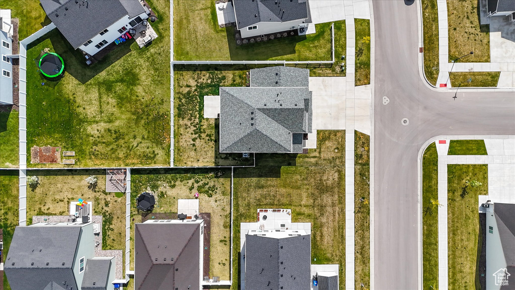 Birds eye view of property with a residential view
