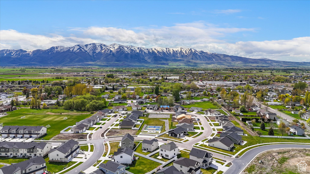 Birds eye view of property featuring a mountain view and a residential view