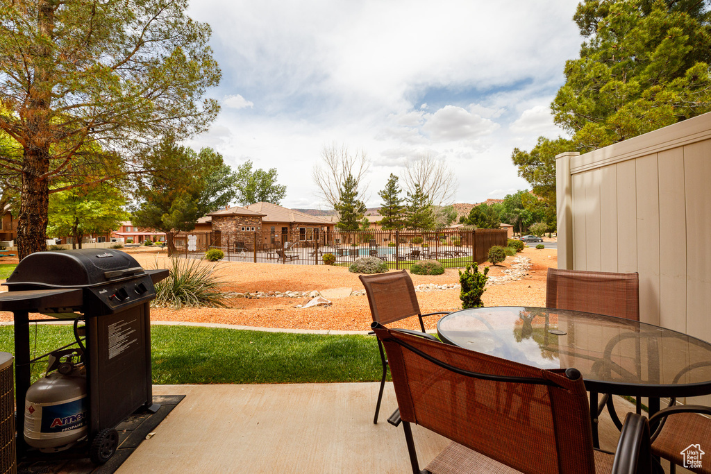View of patio / terrace featuring area for grilling and outdoor dining space