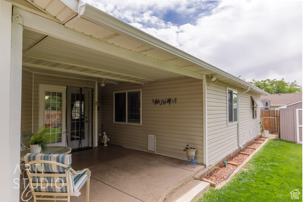 Exterior space with a storage shed and an outdoor structure