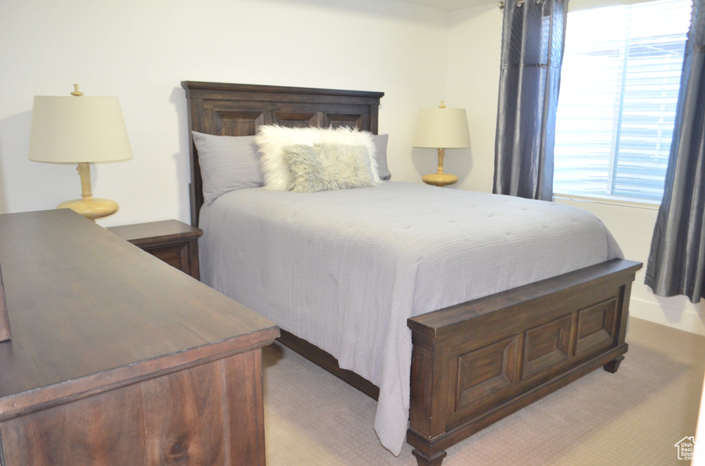 Bedroom featuring carpet flooring