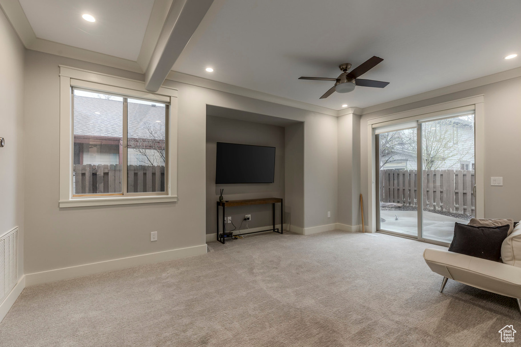 Living area with a ceiling fan, baseboards, recessed lighting, and carpet