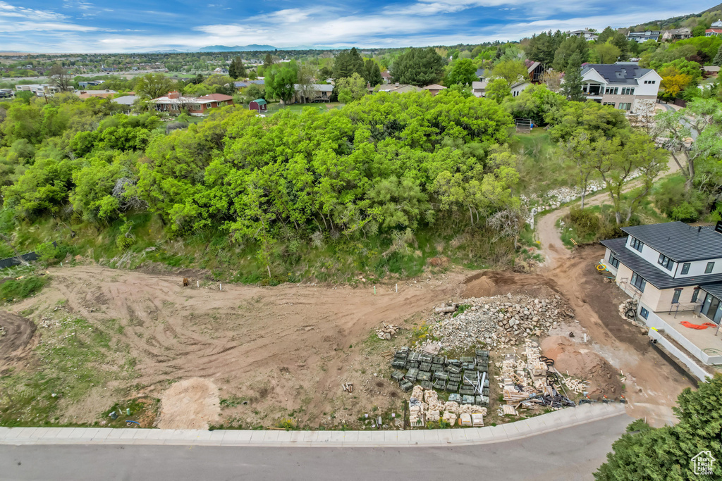 Birds eye view of property with a residential view
