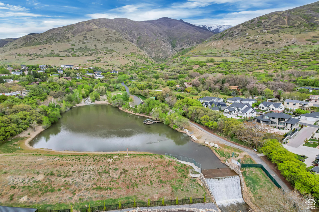 Bird\'s eye view with a water and mountain view and a residential view