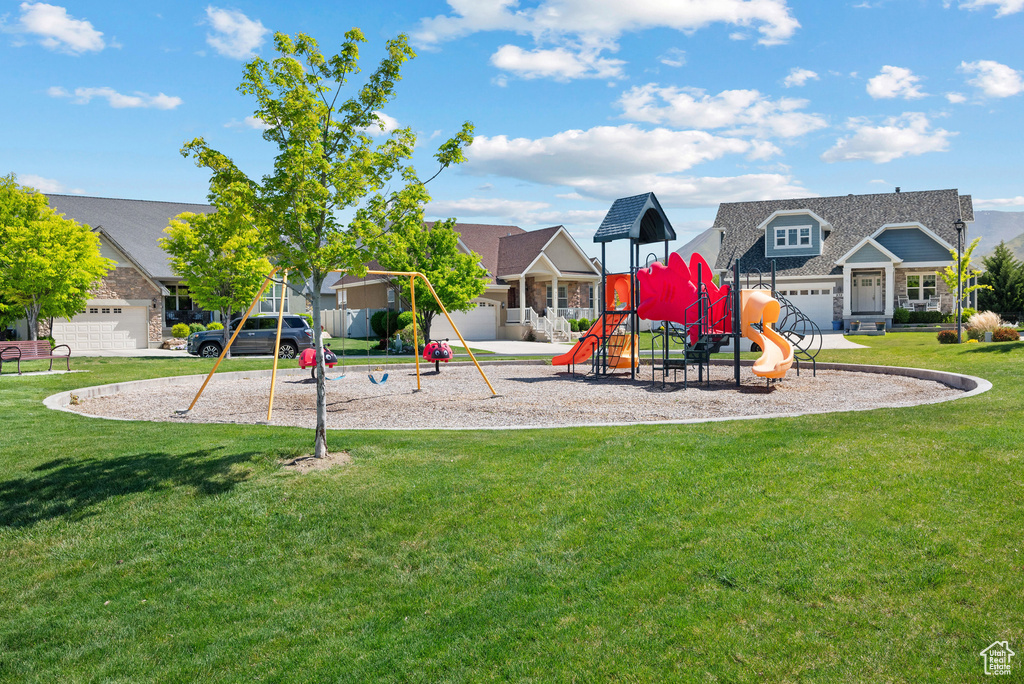 Community play area with a lawn