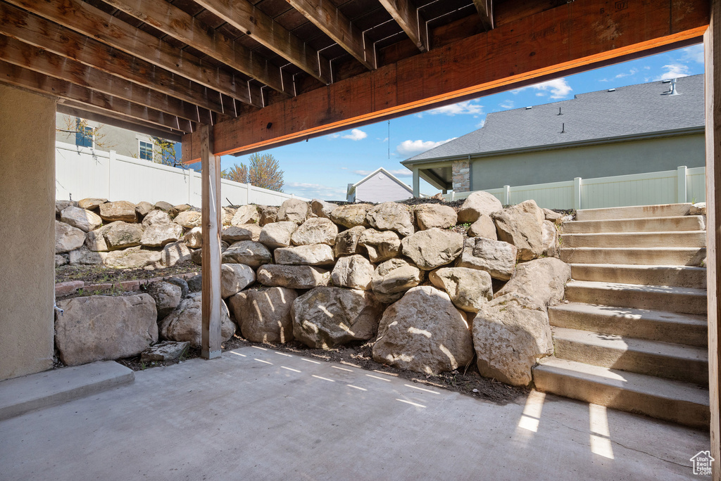 View of patio with fence