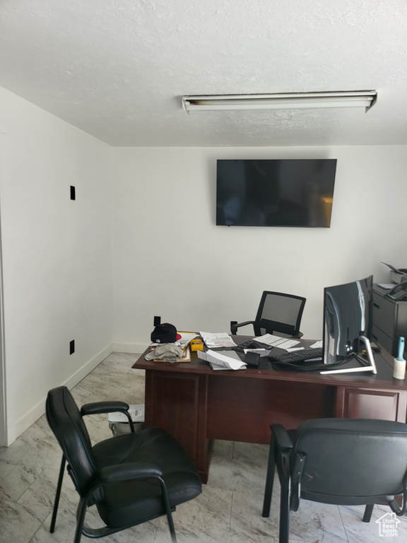 Office space with marble finish floor