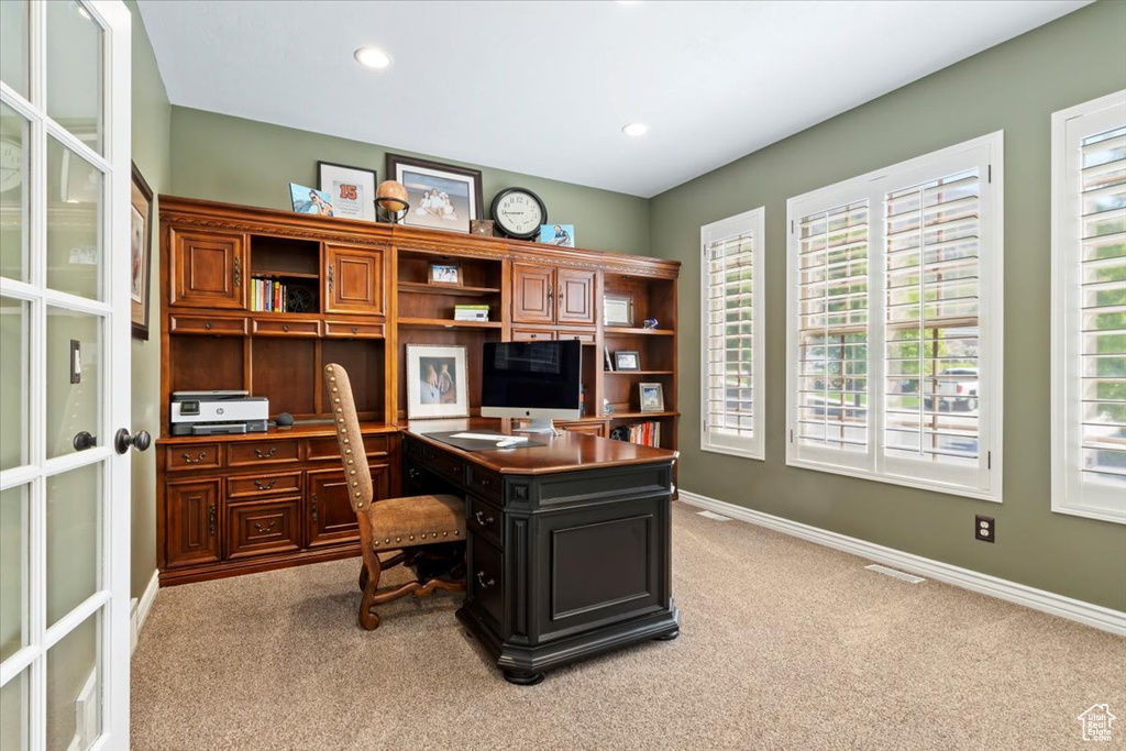 Office with recessed lighting, baseboards, light colored carpet, and visible vents
