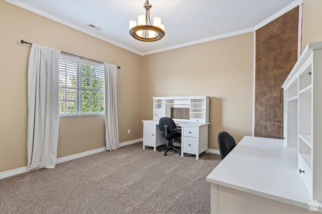 Home office with visible vents, crown molding, an inviting chandelier, baseboards, and carpet