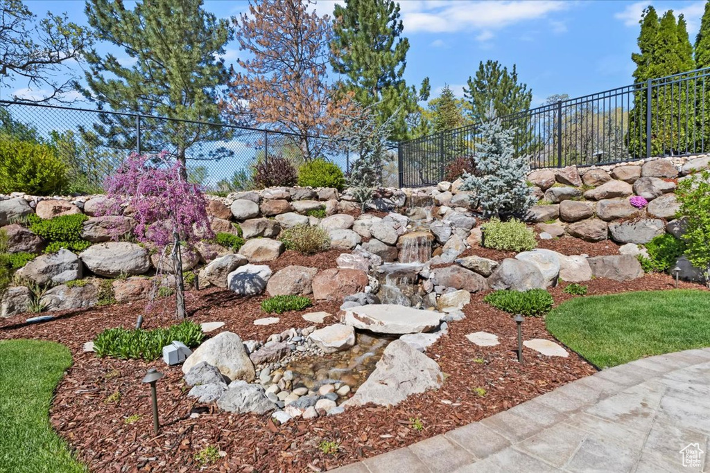 View of yard with fence
