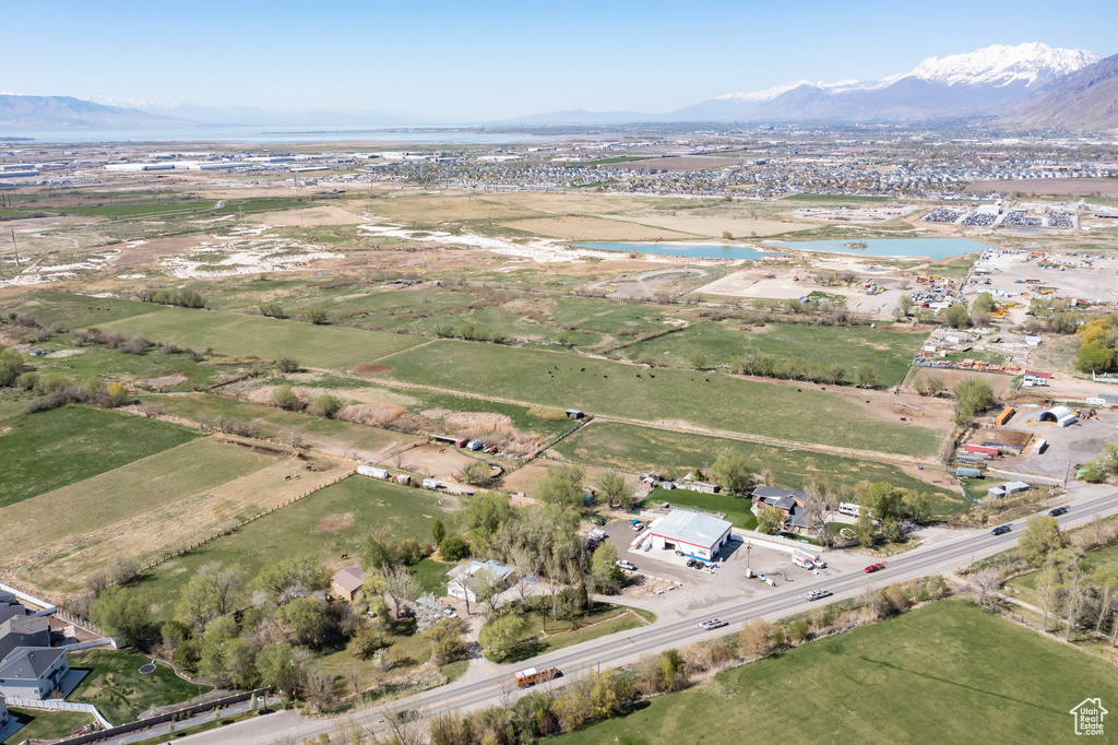 Aerial view featuring a water and mountain view