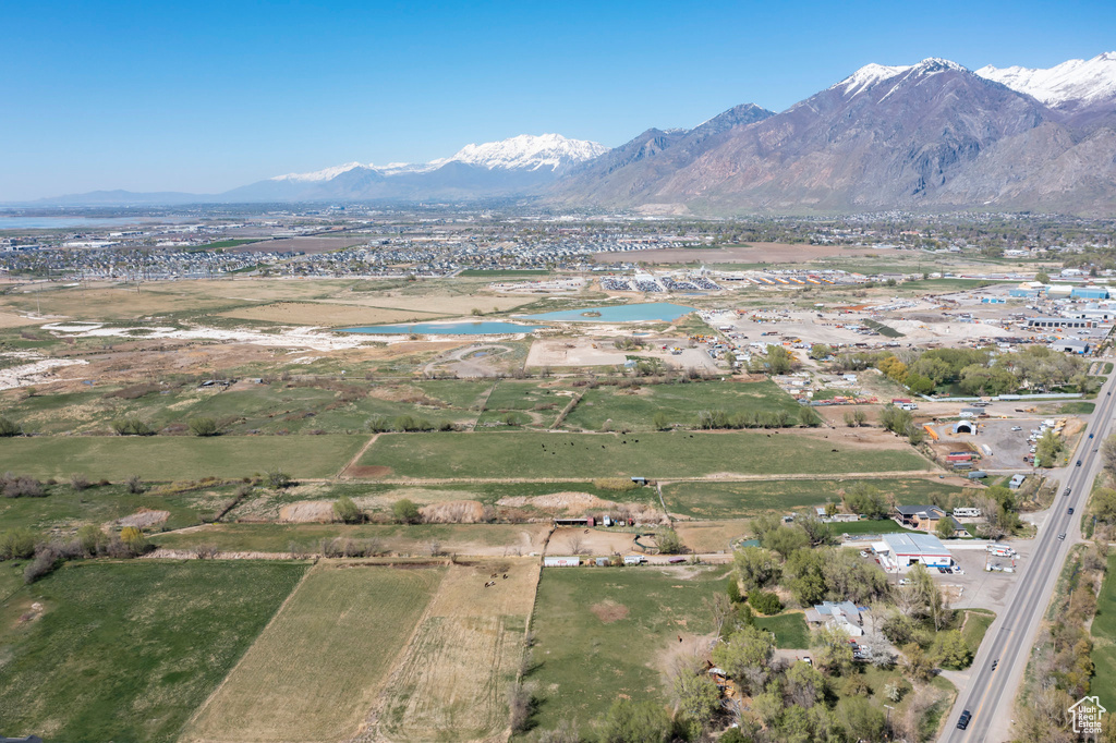 Drone / aerial view with a water and mountain view