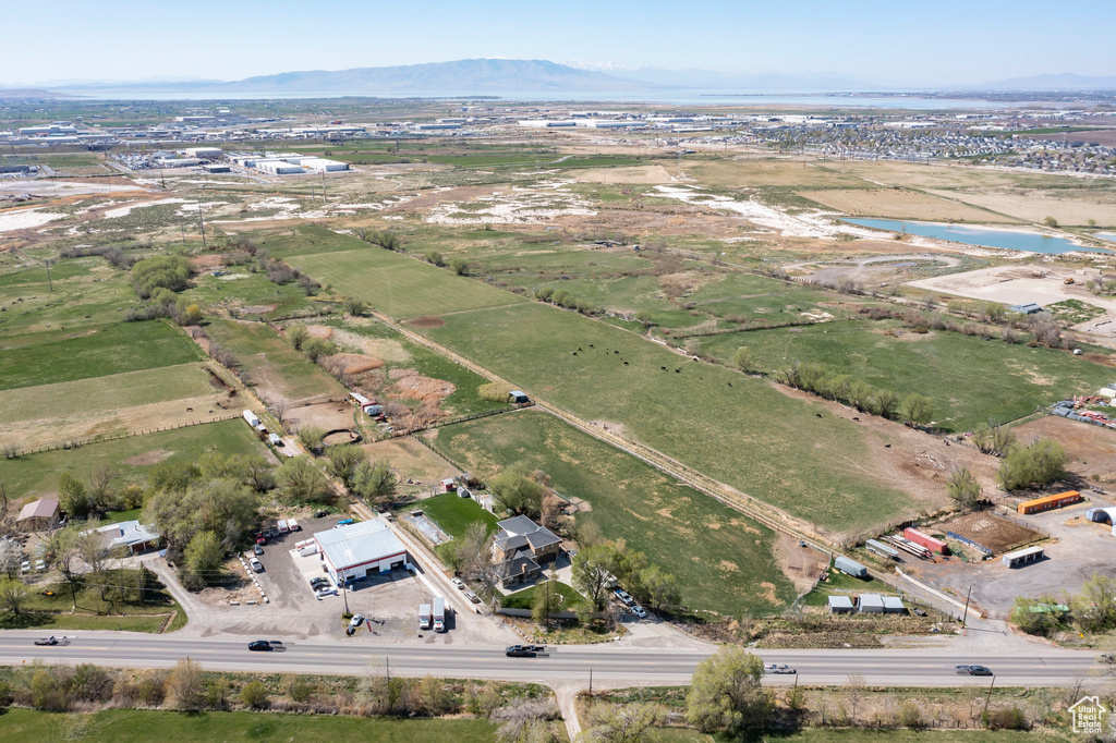 Aerial view featuring a water and mountain view